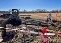 Heavy machinery working on environmental site cleanup at Schafer Environmental.
