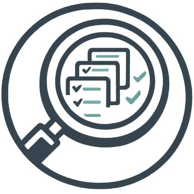 Magnifying glass examining checklists for environmental compliance and testing services.